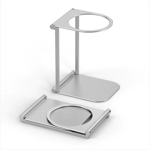 Base stand for NØMA portable espresso maker – silver metal holder with detachable design.