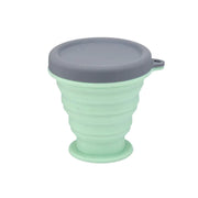 Foldable silicone container for NØMA portable espresso maker, designed to carry pre-dosed ground coffee for brewing anywhere.

